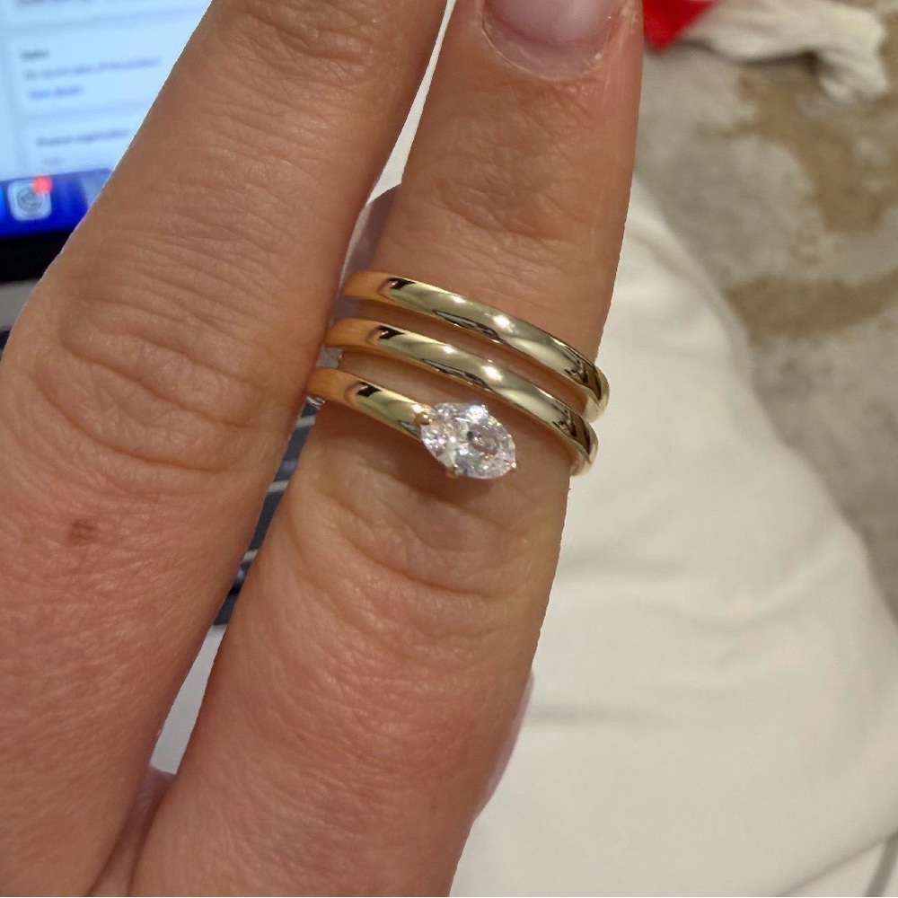 The Triple Halo Pear Ring